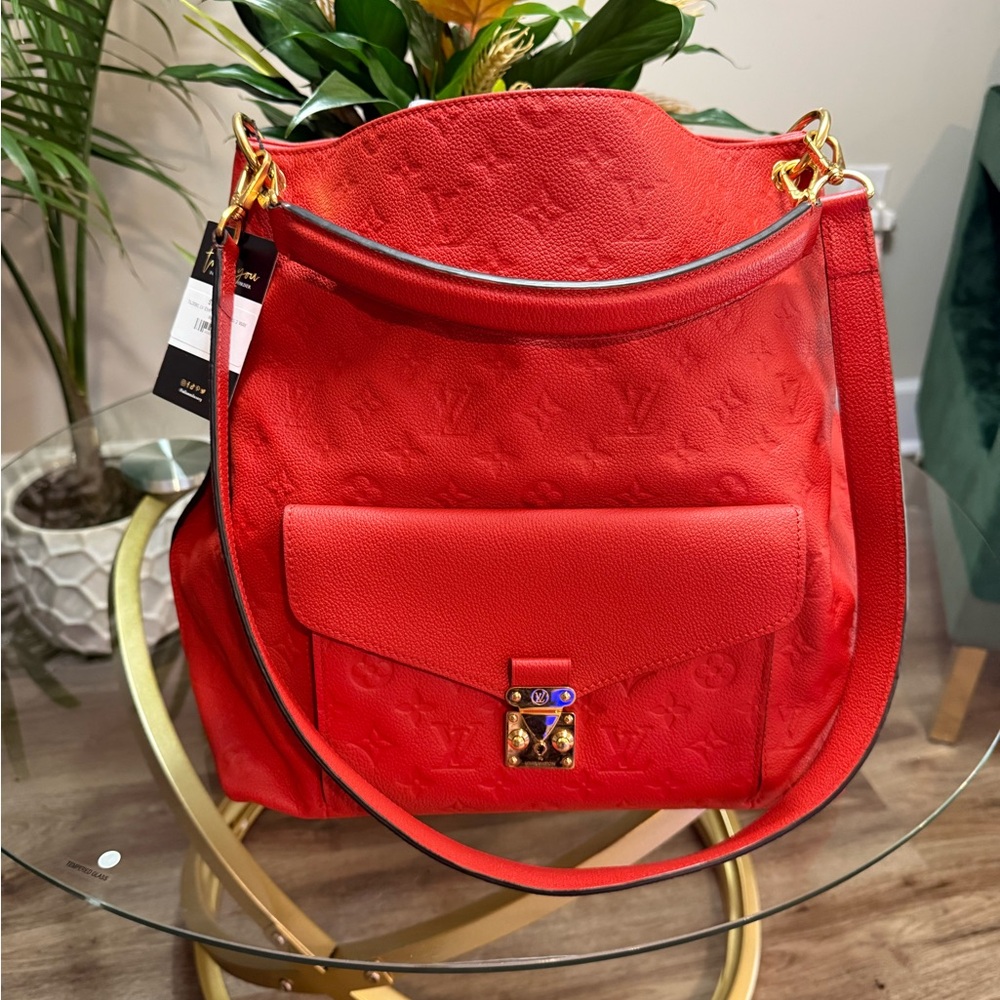 LOUIS VUITTON 
Empreinte Metis Orient
